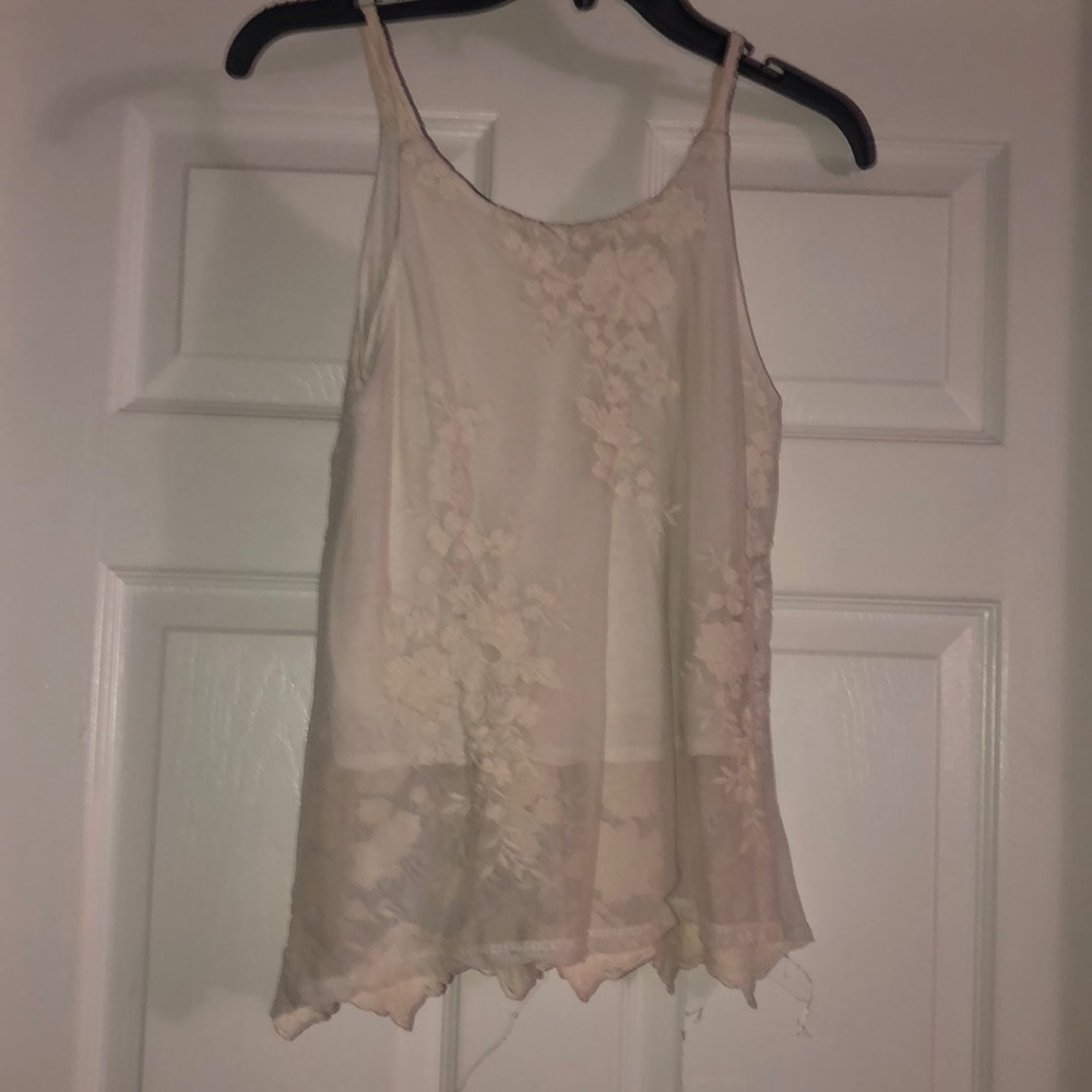 Creamish/white Tank top Has a shirt underneath very comfy.